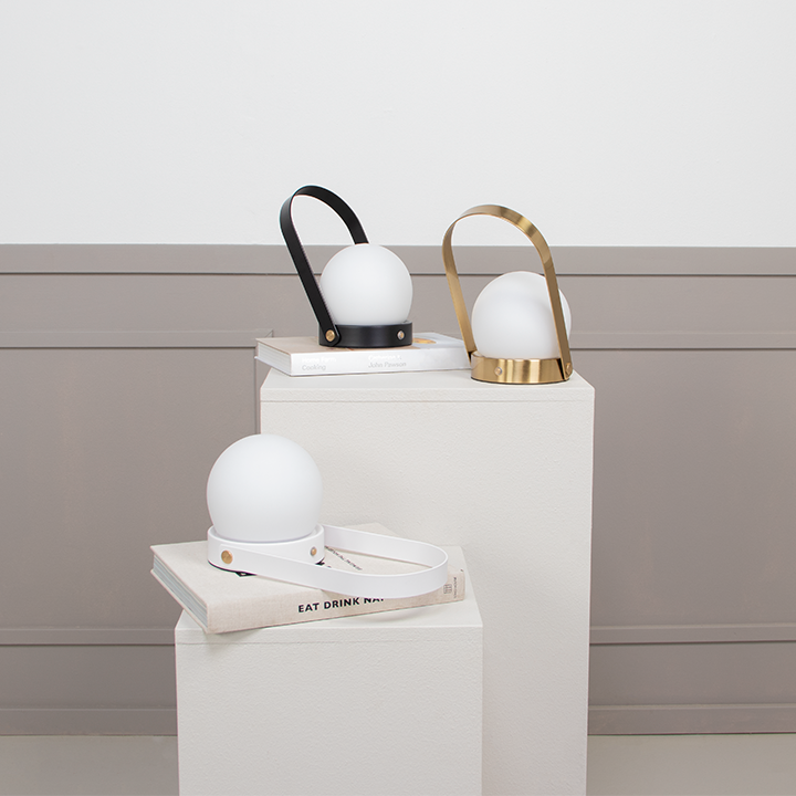 New Dione lamp in black, gold and white